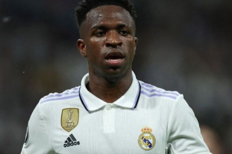 Four arrested as mannequin in Vinicius Jr shirt is hung on bridge after Real Madrid star is racially abused