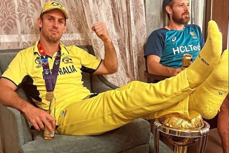 Mitchell Marsh sits with his legs resting on World Cup Trophy, and gets huge flak on social media